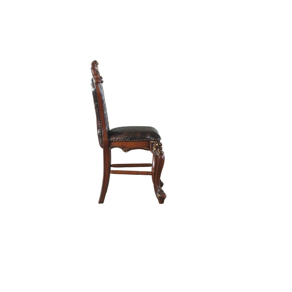 Feel like royalty when you dine in one of the Picardy counter height chairs. In a rich cherry oak finish with a buttery soft PU seat and back, this chair will add sophistication into your home. The outer backrest has exquisite button-tufted details. The g