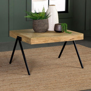  crafted from solid mango wood and finished in a natural tone to highlight its unique grain patterns. Its sturdy iron legs