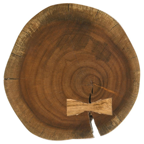  adding earthy elegance. The round tabletop is supported with three ta
