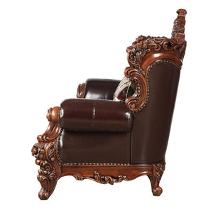  with its classics curve upholstered tight back wrapping around with an elegant cut out at the center top. T