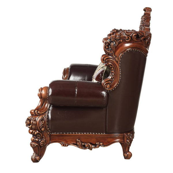  with its classics curve upholstered tight back wrapping around with an elegant cut out at the center top. T