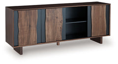 This accent cabinet recalls the rugged textures of nature and brings them indoors. Live edge door fronts pop against the neutral finish for a refined-meets-salvaged feel. Whether it-'s used as a chic storage piece or an eclectic TV stand, this cabinet rad