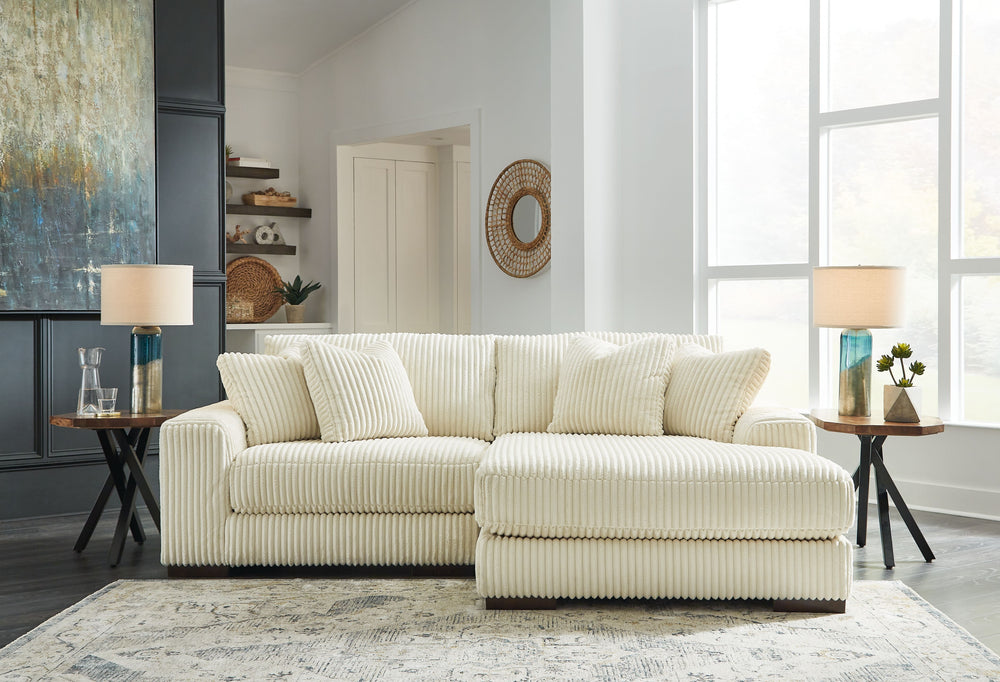 Plush and posh. Showcase your eye for on-trend texture with the statement-making cord upholstery of this sectional with chaise. Its stunningly soft fabric entices in an ivory hue, complementing contemporary color palettes. Sink into the cushions and plan 
