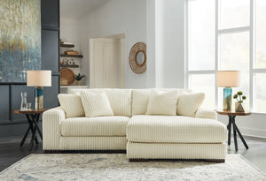 Plush and posh. Showcase your eye for on-trend texture with the statement-making cord upholstery of this sectional with chaise. Its stunningly soft fabric entices in an ivory hue, complementing contemporary color palettes. Sink into the cushions and plan 