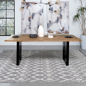  adding a touch of natural charm. Contrasting with the sleek double pedestal black