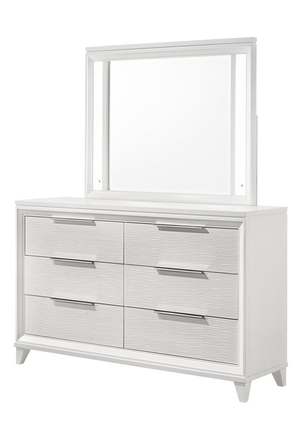 This bedroom set is the epitome of modern elegance, designed for those who desire a sleek and sophisticated sleeping environment. The crisp white finish of the furniture brings a refreshing vibrancy to the room, making it feel both spacious and inviting. 