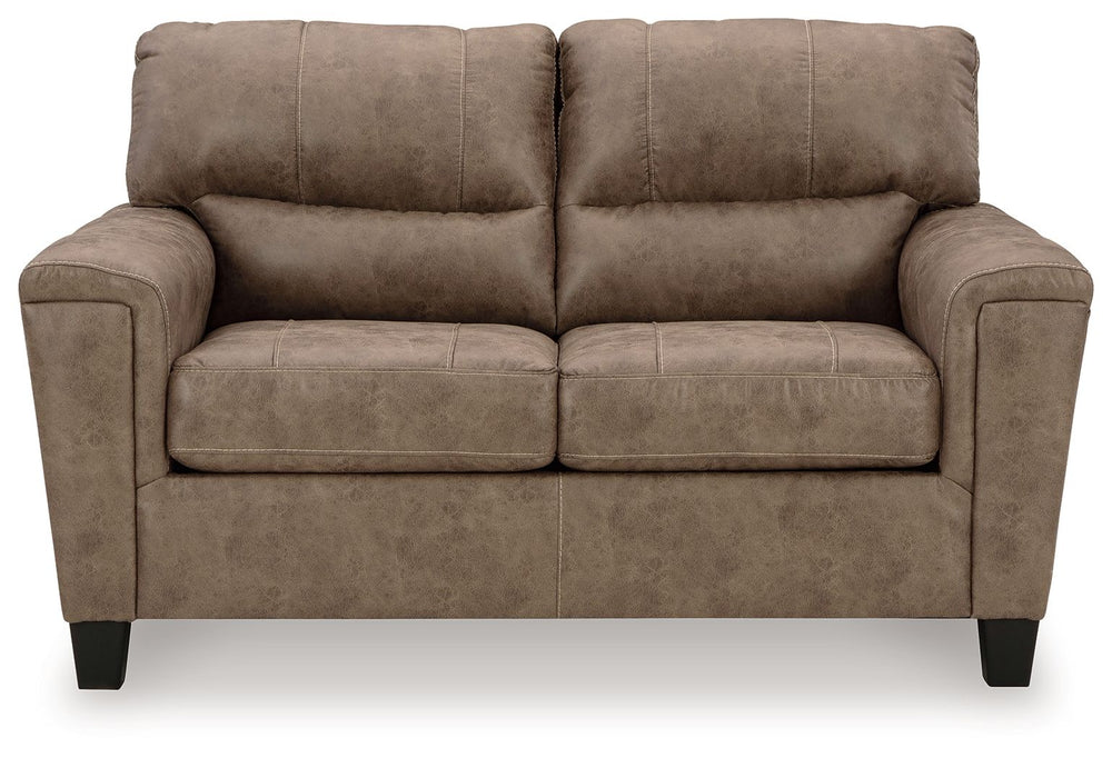 This decidedly modern loveseat proves less is more, bringing simply inviting style to your living room. Take the guesswork out of decoratingâ€”its warm faux leather has a universal appeal, pairing with casual and contemporary aesthetics alike. All you nee