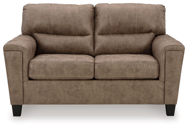 This decidedly modern loveseat proves less is more, bringing simply inviting style to your living room. Take the guesswork out of decoratingâ€”its warm faux leather has a universal appeal, pairing with casual and contemporary aesthetics alike. All you nee