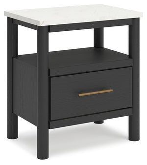 This nightstand reflects your sophisticated approach to boho style. Crafted with both form and function in mind, its replicated marble top beautifully contrasts a matte black finish. The chic and convenient bedside companion offers ambient lighting, along