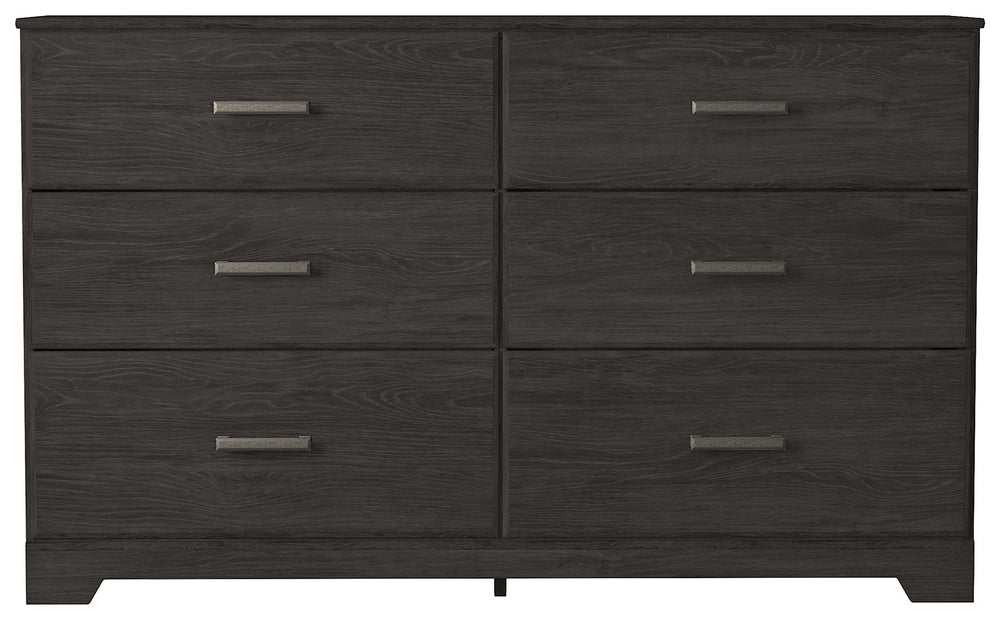 With its clean-lined look and modern attitude, this dresser is a fresh style awakening. A warm charcoal hue over replicated oak grain easily complements other furniture finishes. Smooth drawer fronts with antiqued pewter-tone handles complete the aestheti