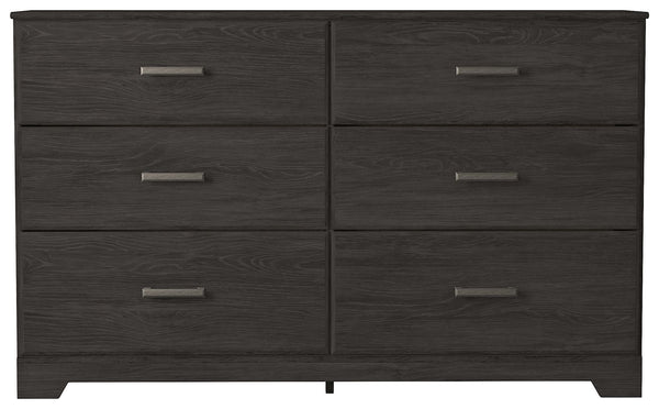  this dresser is a fresh style awakening. A warm charcoal hue over replicated oak grain easily complements other furniture finishes. Smooth drawer fronts with antiqued pewter-tone handles complete the aestheti