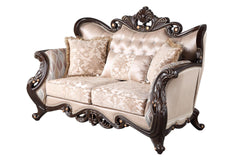 The Royal Classics Constantine Loveseat in cherry brings together heirloom quality craftsmanship and luxurious design, making it a stunning addition to any living space. Expertly crafted from solid pine and adorned with premium polyurethane carvings, this