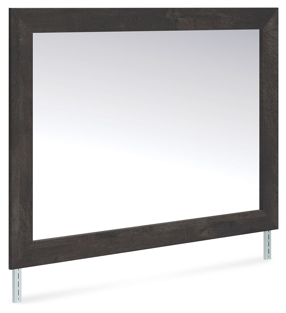 This bedroom mirror puts a casually chic twist on everyday function. Its rustic charcoal finish pairs well with other neutrals and pops of color alike, giving you the flexibility to change up your aesthetic as you please. And for that much more variety, t