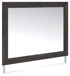 This bedroom mirror puts a casually chic twist on everyday function. Its rustic charcoal finish pairs well with other neutrals and pops of color alike, giving you the flexibility to change up your aesthetic as you please. And for that much more variety, t