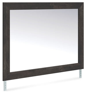 This bedroom mirror puts a casually chic twist on everyday function. Its rustic charcoal finish pairs well with other neutrals and pops of color alike, giving you the flexibility to change up your aesthetic as you please. And for that much more variety, t