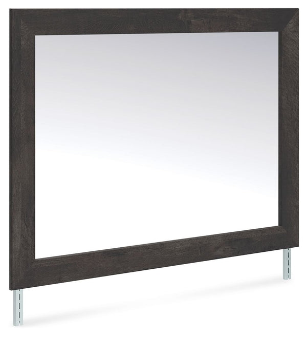 This bedroom mirror puts a casually chic twist on everyday function. Its rustic charcoal finish pairs well with other neutrals and pops of color alike, giving you the flexibility to change up your aesthetic as you please. And for that much more variety, t