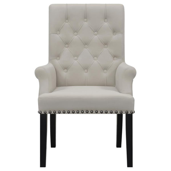  while the addition of padded armrests enhances comfort. Hand-applied nailhead trim o