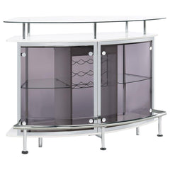 Chic with striking mixed material design, this contemporary bar unit elevates a modern style home. With a curved shape, this bar unit works perfectly in the corner of a media room or dining space, offering a place for guests to conjure together and serve 