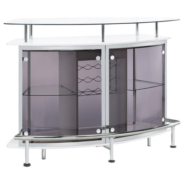 Chic with striking mixed material design, this contemporary bar unit elevates a modern style home. With a curved shape, this bar unit works perfectly in the corner of a media room or dining space, offering a place for guests to conjure together and serve 