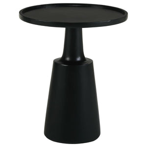 This global-inspired round accent table offers a striking design for any space. An elegant, solid contoured base tapers toward the top that supports a round table surface. Raised edges define the silhouette even further and keep items in place. Made of an