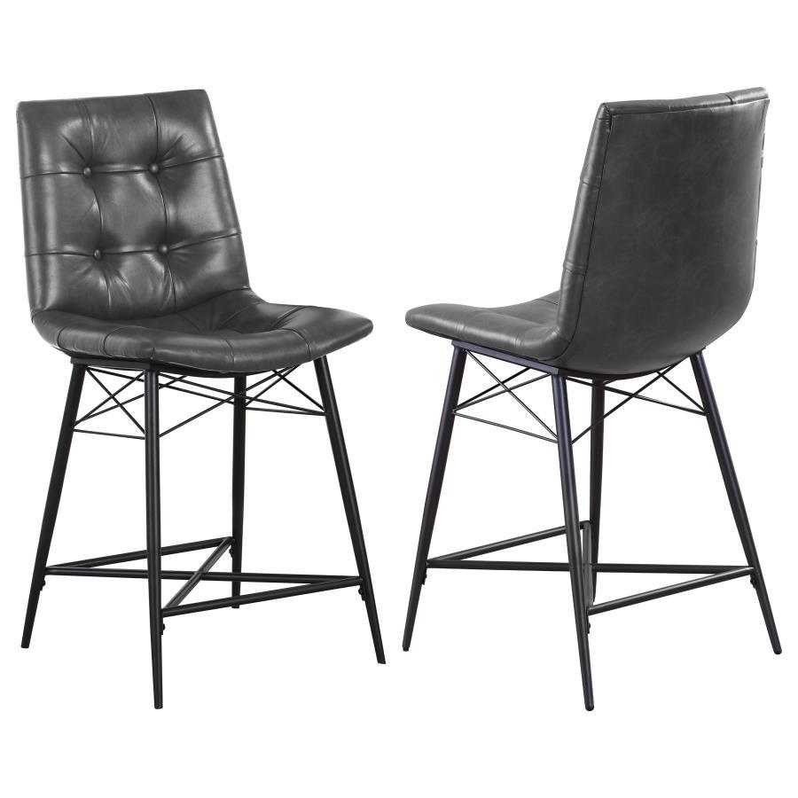 Cool and cozy, this counter height stool is the ultimate dining room upgrade. The padded seat is wrapped in smooth leatherette for an inviting look and feel. Button tufting adds a subtle, decorative touch. A sleek, metal base gives it a modern look while 