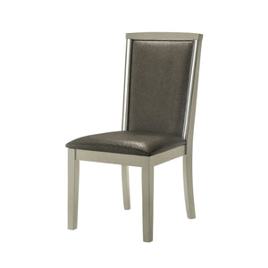Experience the durability and elegance of the Lumina Dining Chairs, a set of two crafted from solid Rubberwood for lasting stability. Their high gloss gray finish perfectly complements the shimmering silver upholstery, adding a touch of glamour to any mod