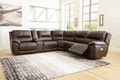 Load up on comfort in a cool, clean-lined and contemporary way with the Dunleith power reclining sectional in chocolate brown. Rest assured, the leather match upholstery is enriched with a pebble grain effect for authentic appeal and enhanced with jumbo s