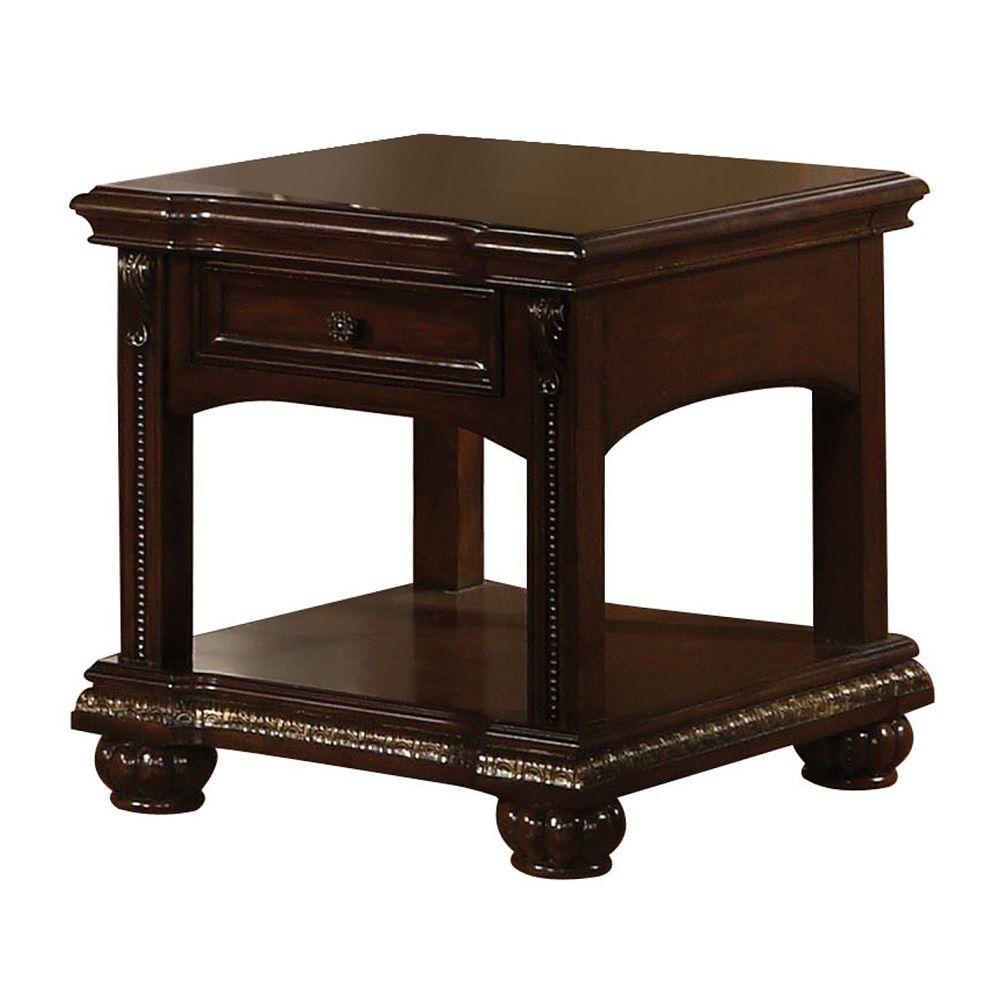 The Anondale End table is finished in brown cherry. Featuring Storage Drawers combined with modern style found in clear glass insert top and casualness found in storage drawers. The turned legs and reeded bun footing complete the timeless classic look.<br