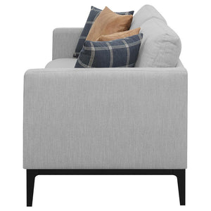  grey upholstery subtly plays up its simple silhouette. Two matching 