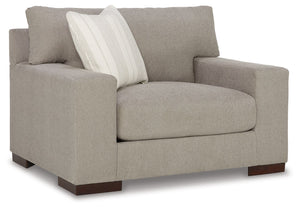 Classic comfort gets a mod twist with this oversized chair. Its minimalistic approach and structured silhouette bring a clean-lined design element to your living room. Sink into the positively plush cushions while relaxing solo, or curl up with a glass of