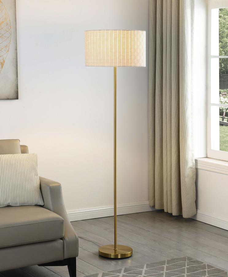 An elegant addition to your living room or bedroom, the Ramiro floor lamp contributes to a tasteful interior design scheme. Versatile and simple at the same time, its pleasing palette complements any room design. This floor lamp features a gleaming gold f