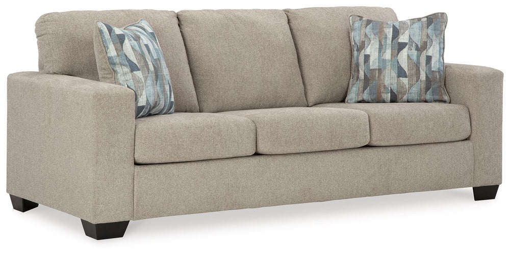 Youâ€™re in for a neat treat with this living room set. Its comfy seats are covered in soft, textural upholstery, and the wide track arms are eager to support your quest for total relaxation. Distressed abstract toss pillows bring a fresh breath of contem