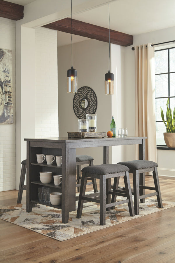 Casual lifestyle design constructed with Acacia veneer and solids. Finished in an antiqued gray wash color. X-back chairs feature solid wood frame and cushioned seat covered with a gray textured polyester fabric with nail head trim. Matching backless benc