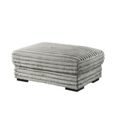 The Embrace Ottoman in gray is the perfect addition to your living space, offering both style and functionality. Crafted from 100% gray polyester fabric with a plush, blanket-like texture, it promises ultimate relaxation. This versatile piece can be used 