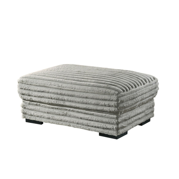 The Embrace Ottoman in gray is the perfect addition to your living space, offering both style and functionality. Crafted from 100% gray polyester fabric with a plush, blanket-like texture, it promises ultimate relaxation. This versatile piece can be used 