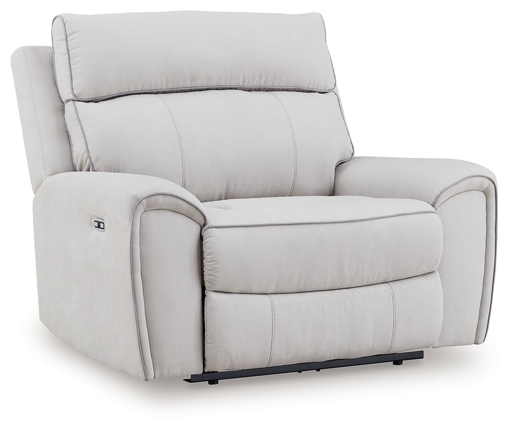 Smart, clean and ultra modern, this power recliner is utterly in vogue. You-'ll love its indulgent cushions and contemporary bustle back styling. The sumptuous fabric, accentuated with contrasting welting, easily blends with your decor. And with reclining