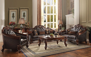 Tracing back to the classical Baroque era, expressed with intent and conviction, our new interpretation of Vendome II is donned. The Vendome II sofa-'s two-toned brown faux leather and cherry upholstery is grand and classy with crystal like button tufting