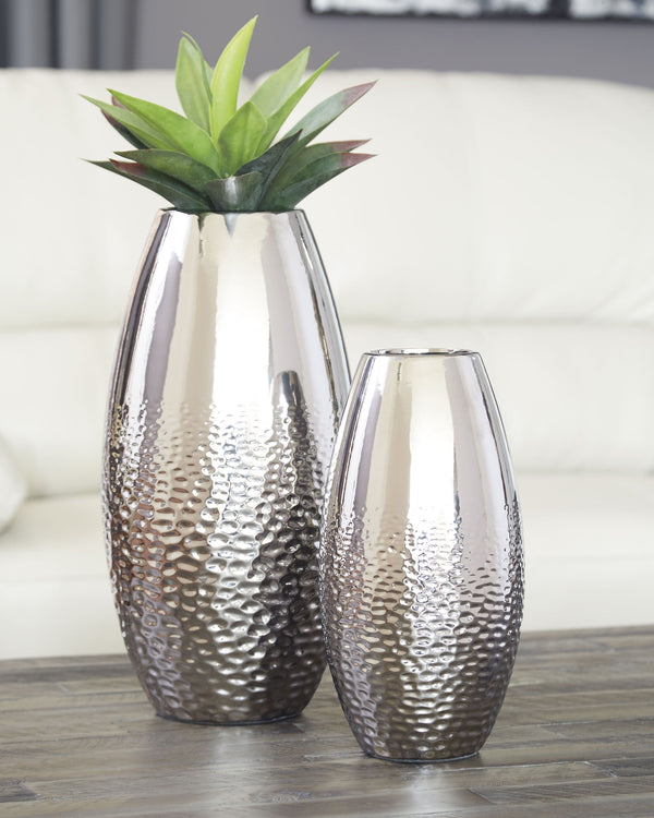  reflecting your eclectic eye for design. The textural pattern gracing the sides of the vases evokes ripples of water. A spectacular silvertone glazed finish adds a splash of sheen and shine.<br><br><b>Additional
