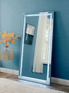 The faux diamond inlay is the finishing touch to the glamorous Noralie Mirror. This accent mirror features LED lighting with faux diamond inlay that glimmer and glitter in the available light. Its rectangular frame will work in your entrance, hallway, or 