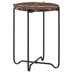 Blending timeless elegance with industrial charm, this round accent table features a rich red marble top, adding a bold and sophisticated touch to any space. The sleek black iron base showcases a unique criss-cross design, providing stability while mainta