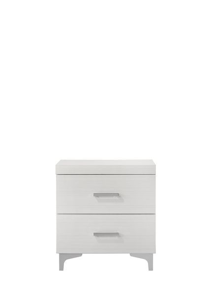 The Casilda bedroom collection will help you create the perfect retreat. In a white finish to easily style and works with various color schemes. Tying each piece together are the metal legs. The bed boasts a PU padded headboard with button tufting in a gr