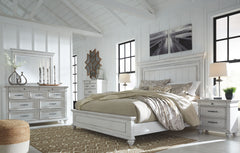 Made with veneers and select hardwood solids in a distressed whitewashed finish. Design features updated traditional styling with generously scaled moulding details. Dresser features 7 full sized drawers with 2 small scaled accessory drawers. Ball bearing