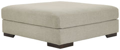 Relax in style on this oversized ottoman. With a look and feel inspired by fine menswear, the spacious piece has rich textures that are easy on the eyes and a pleasure to touch. Its soft, light gray hue and smart tailoring look right at home in any decor.