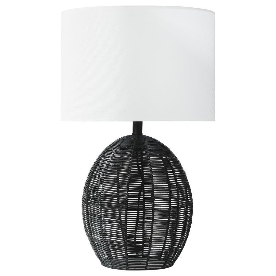 This table lamp combines natural textures with modern craftsmanship, featuring a rounded black rattan base that adds visual intrigue. Paired with a sturdy metal frame for durability and a neutral fabric shade for soft, even lighting, it offers both style 