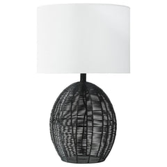 This table lamp combines natural textures with modern craftsmanship, featuring a rounded black rattan base that adds visual intrigue. Paired with a sturdy metal frame for durability and a neutral fabric shade for soft, even lighting, it offers both style 