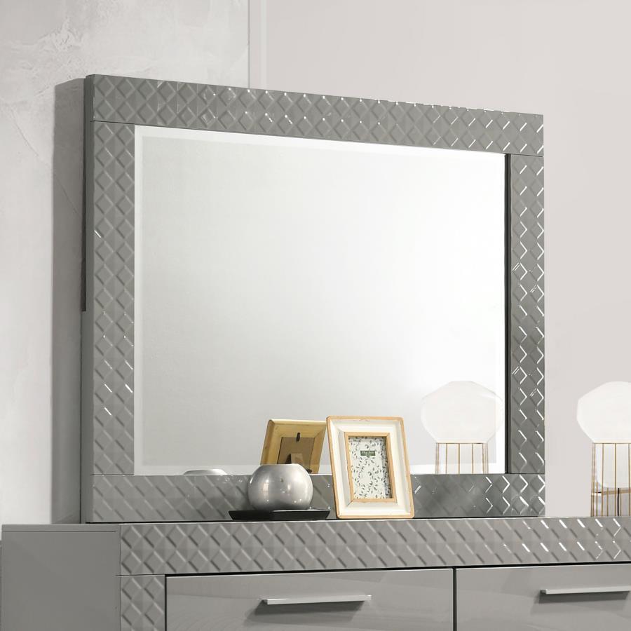 Complete your dresser with this elegant mirror, designed to enhance the modern aesthetic of your bedroom. The high gloss finish and 3-dimensional diamond tile emboss perfectly complement the dresser, creating a cohesive look. This mirror features a sturdy