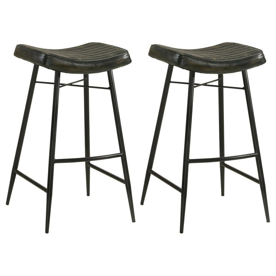 Inject a heavy dose of casual character to your kitchen or bar with the rich antiqued leather upholstery featured on a classic backless stool. Its gently curved seat cradles you in comfort, with channel tufting that adds texture and compelling style. A du