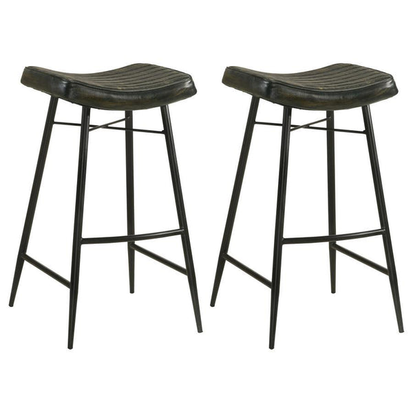 Inject a heavy dose of casual character to your kitchen or bar with the rich antiqued leather upholstery featured on a classic backless stool. Its gently curved seat cradles you in comfort, with channel tufting that adds texture and compelling style. A du