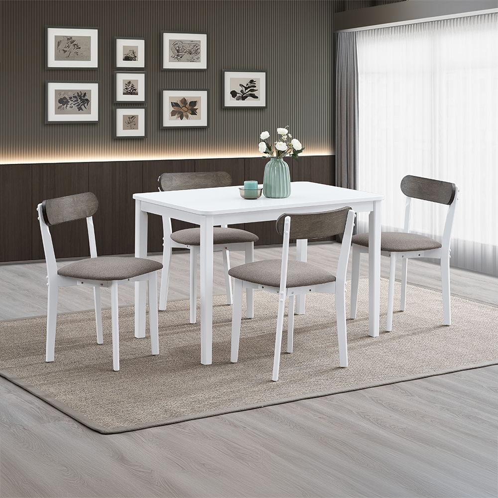 Fidelity dining set exudes modern charm with its sleek design and two-tone chairs. This dining set includes a stylish table and four comfortable chairs, perfect for family meals and gatherings. The chairs feature contrasting tones that add a touch of eleg