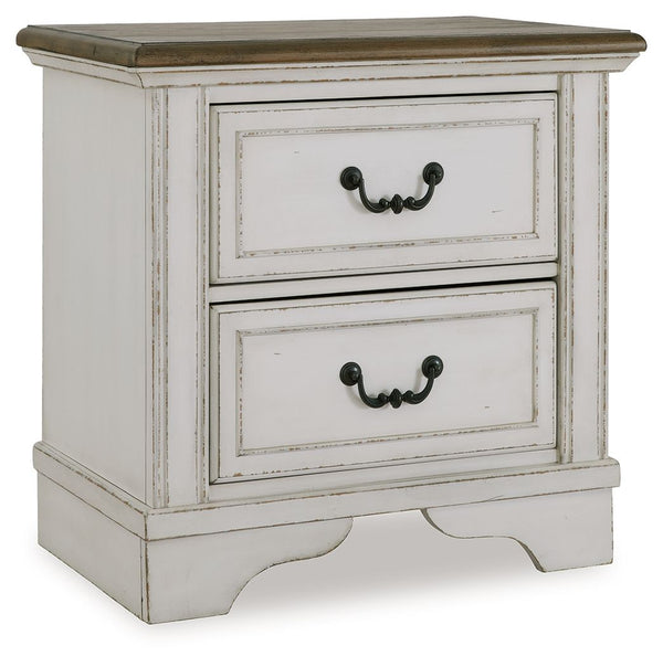 Traditional design. Casual appeal. You can have it all with this nightstand. A relaxed two-tone aesthetic merges with ornate profiled drawer fronts and pilasters to give the distinctive piece an allure all its own. Expansive drawers with quality dovetail 